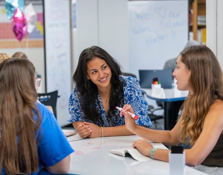 three students studying together in the learning center